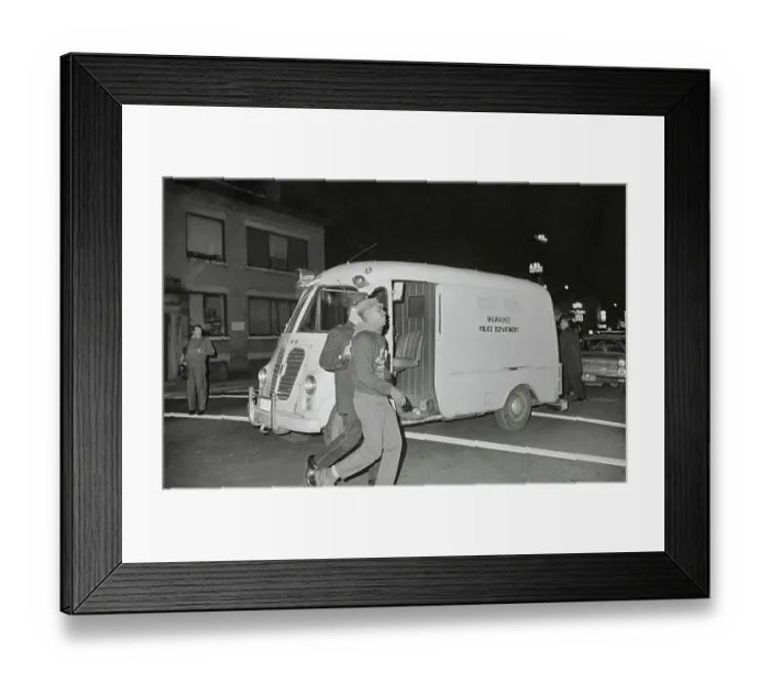 Framed Print : Policeman Escorting a Person Framed Print : Policeman Escorting a Person