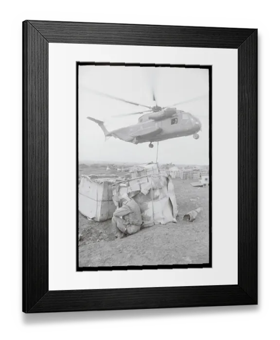 Framed Print : Helicopter Landing Supplies Framed Print : Helicopter Landing Supplies