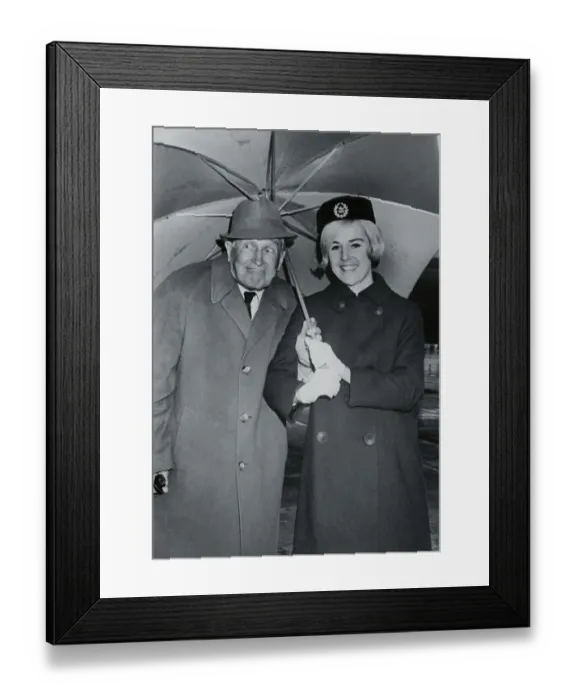 Framed Print : Maurice Chevalier Posing with a Flight Attendant Framed Print : Maurice Chevalier Posing with a Flight Attendant