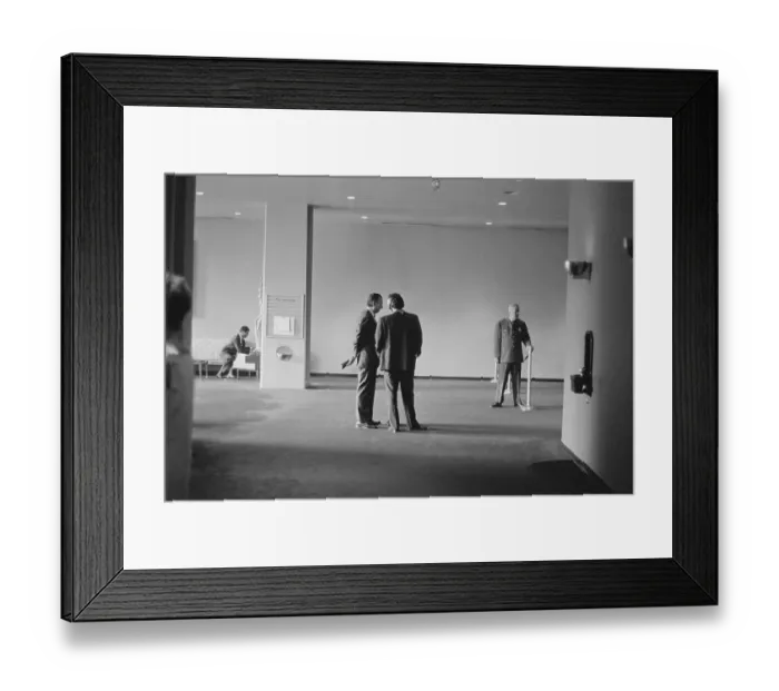 Framed Print : UN Ambassadors Conversing in Hallway