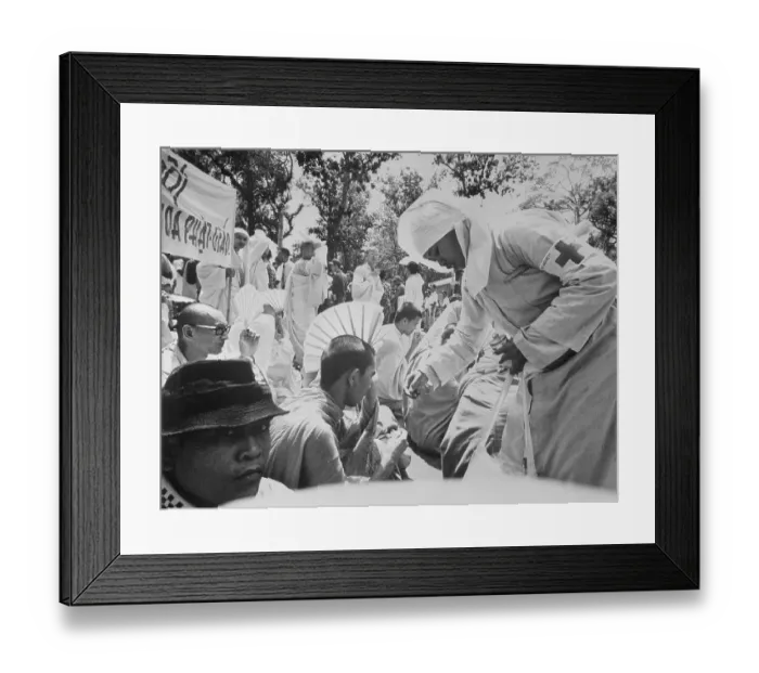 Framed Print : Nun Administer First Aid to a Protester Framed Print : Nun Administer First Aid to a Protester