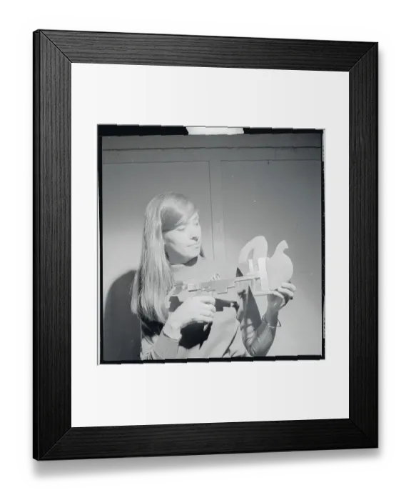 Framed Print : Women Demonstrating Use of a Stapler Framed Print : Women Demonstrating Use of a Stapler