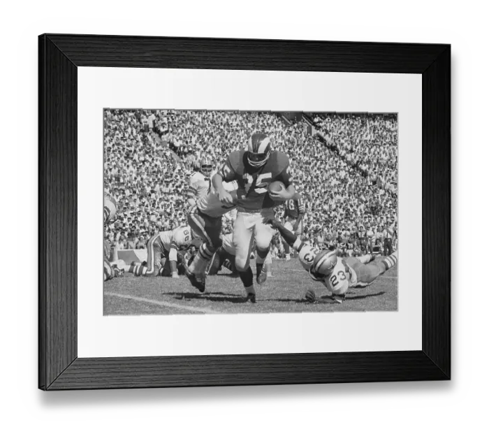 Framed Print : Rams Football Player Running for Touchdown Framed Print : Rams Football Player Running for Touchdown