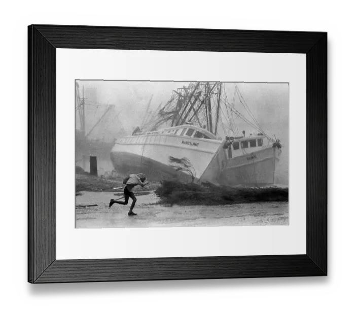 Framed Print : Hurricane Wind Toppeling Shrimp Boats