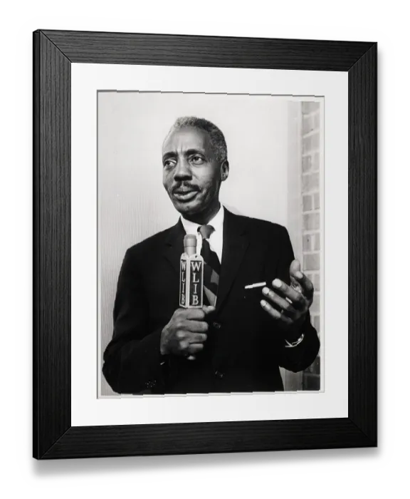 Framed Print : Leon Lewis Holding WLIB Microphone