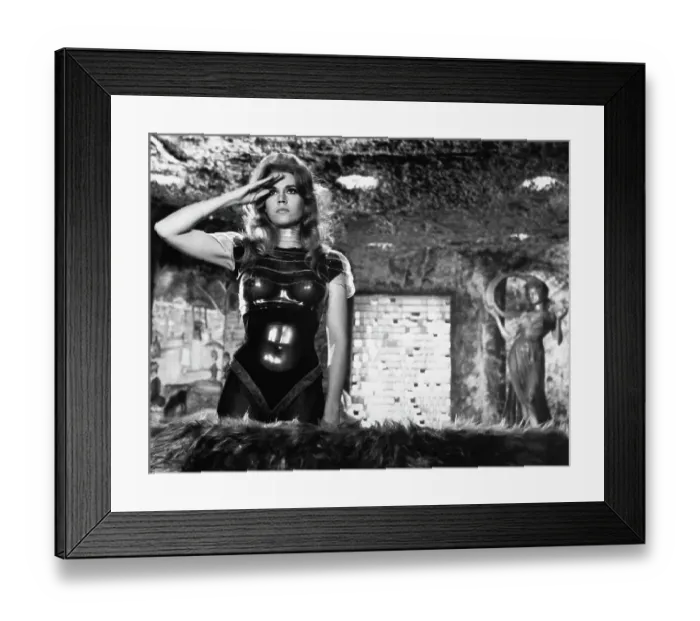Framed Print : Jane Fonda Saluting In A Movie Scene