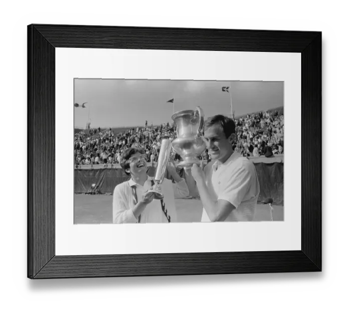 Framed Print : Billie Jean King and John Newcombe Holding Trophies Framed Print : Billie Jean King and John Newcombe Holding Trophies