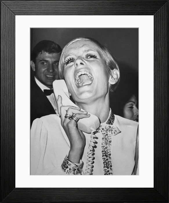 Framed Print : Twiggy Laughing on the Phone Framed Print : Twiggy Laughing on the Phone