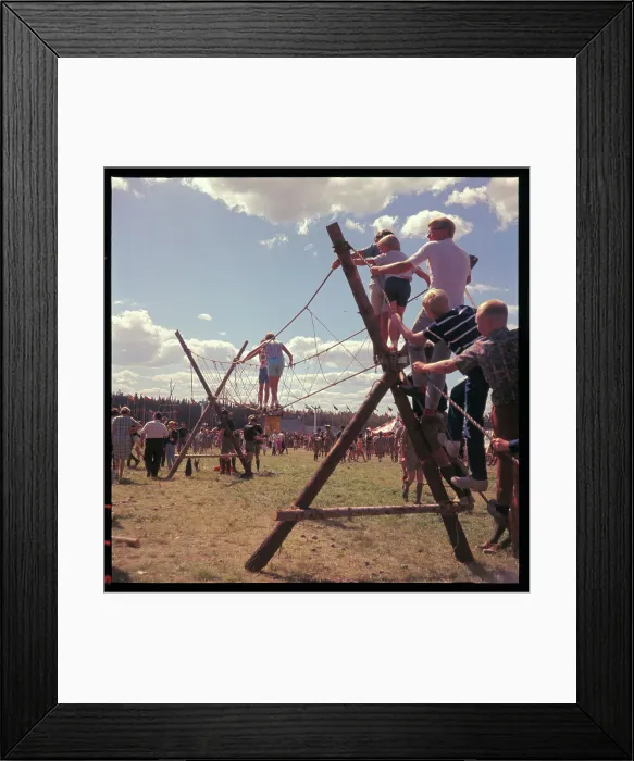 Framed Print : Children Crossing a Rope Bridge Framed Print : Children Crossing a Rope Bridge