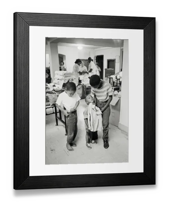 Framed Print : Children Trying On New Clothes Framed Print : Children Trying On New Clothes