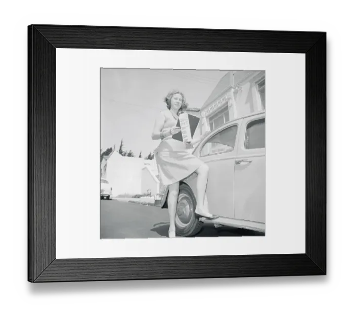 Framed Print : Woman Posing Next to a Car Framed Print : Woman Posing Next to a Car