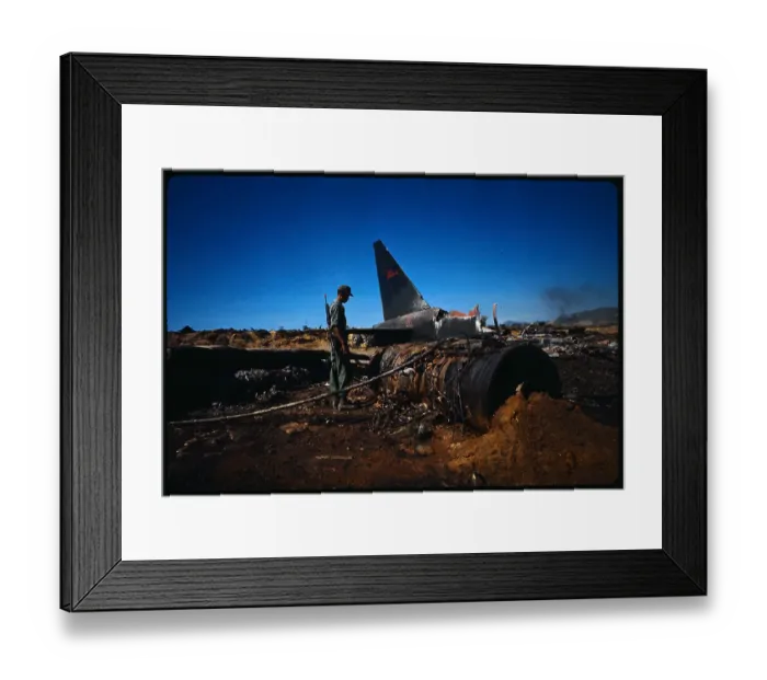 Framed Print : Man Examining Crash Site Framed Print : Man Examining Crash Site