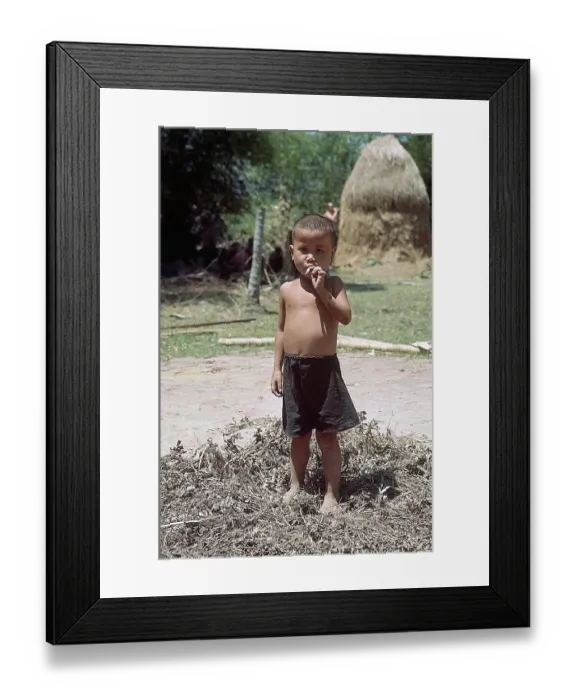 Framed Print : Vietnamese Boy Smoking Cigarette Framed Print : Vietnamese Boy Smoking Cigarette
