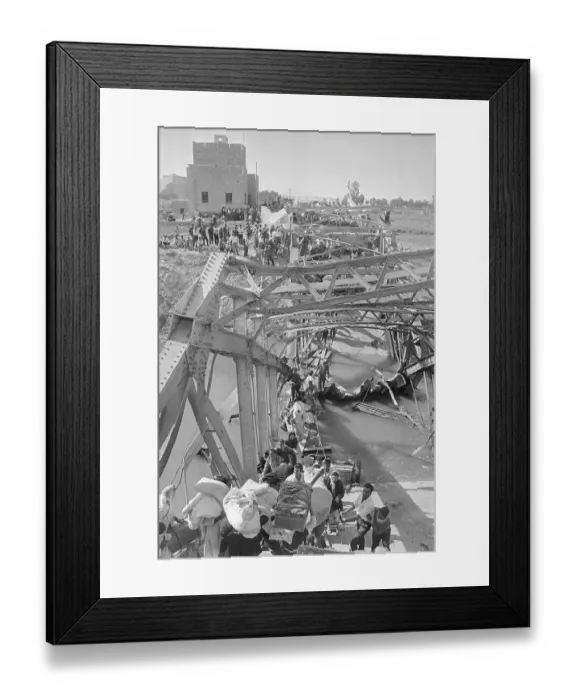 Framed Print : Refugees Walk Across Damaged Bridge Framed Print : Refugees Walk Across Damaged Bridge
