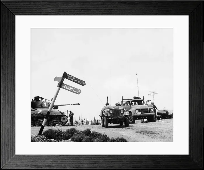 Framed Print : Israeli Vehicles Move Towards Jericho
