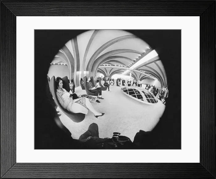 Framed Print : People Sitting in Talking Chairs at Expo 67
