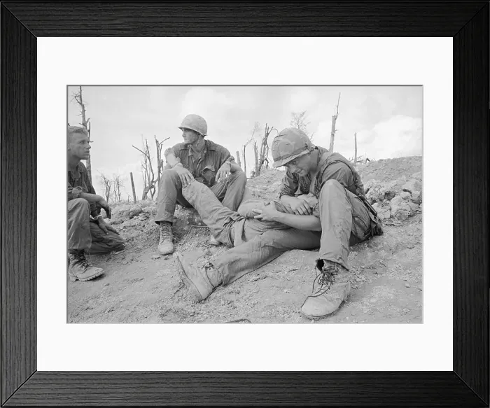 Framed Print : Marines Holding Injured Comrade