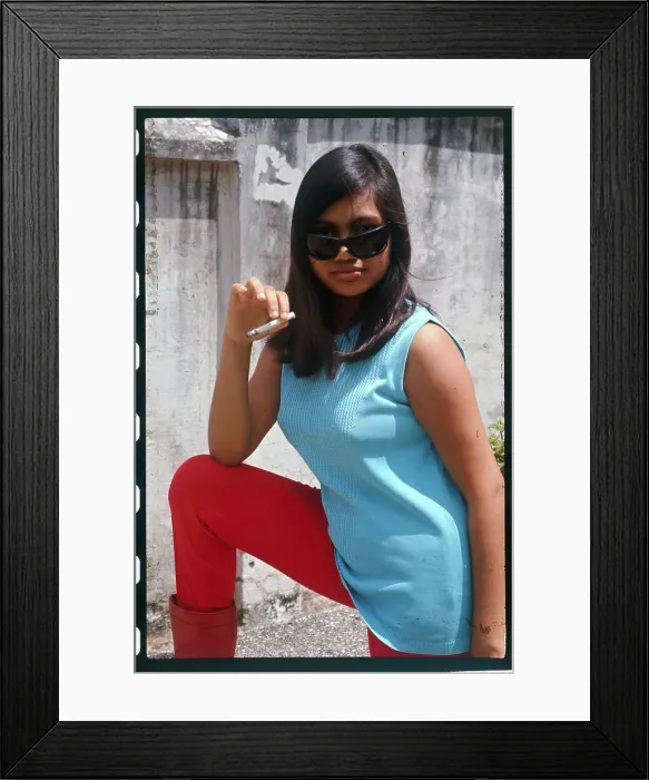 Framed Print : Westernized Indonesian Teen Smoking Cigarette Framed Print : Westernized Indonesian Teen Smoking Cigarette