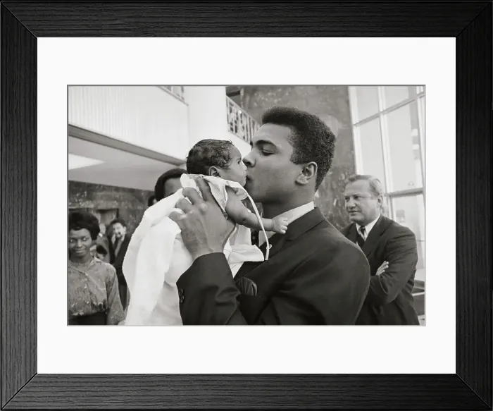 Framed Print : Cassius Clay Kissing Very Small Baby Framed Print : Cassius Clay Kissing Very Small Baby