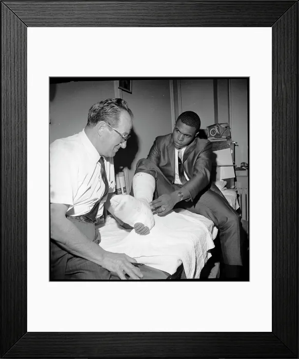 Framed Print : Gale Sayers Discusses His Cast With a Trainer Framed Print : Gale Sayers Discusses His Cast With a Trainer