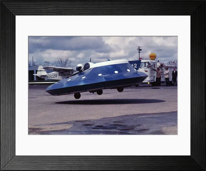 Framed Print : Paul Moller Landing His Own Flying Saucer Framed Print : Paul Moller Landing His Own Flying Saucer
