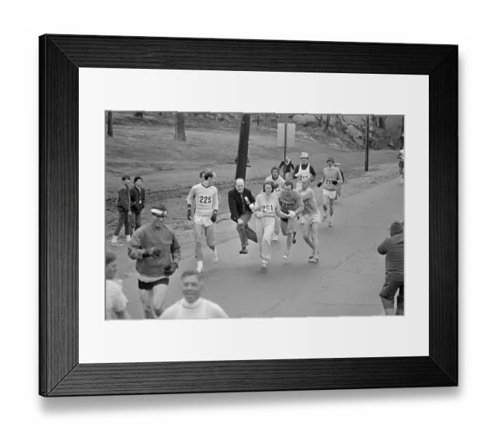 Framed Print : Marathon Director Bill Cloney Trying to Stop Female Runner Framed Print : Marathon Director Bill Cloney Trying to Stop Female Runner