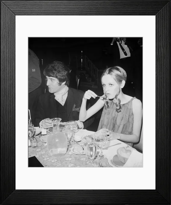 Framed Print : Twiggy Eating at Party Framed Print : Twiggy Eating at Party