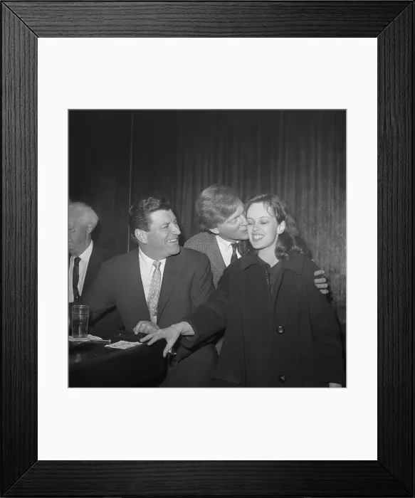 Framed Print : Gerry Mulligan Kissing Wife Sandy Dennis Framed Print : Gerry Mulligan Kissing Wife Sandy Dennis