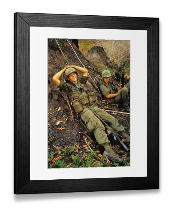 Framed Print : Soldier Relaxing on Ground With Hands Over Head