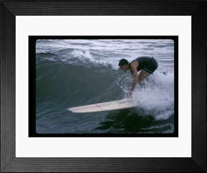 Framed Print : Surfer Catching a Wave Framed Print : Surfer Catching a Wave