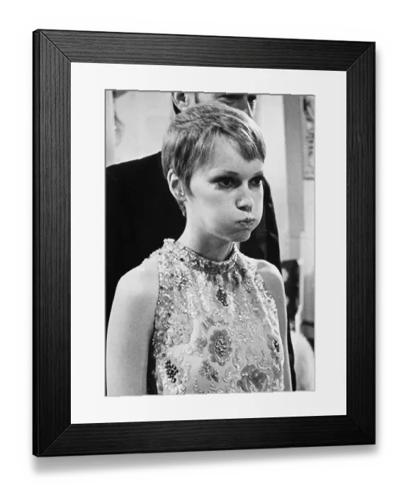Framed Print : Mia Farrow Puffing Out Her Cheeks Framed Print : Mia Farrow Puffing Out Her Cheeks