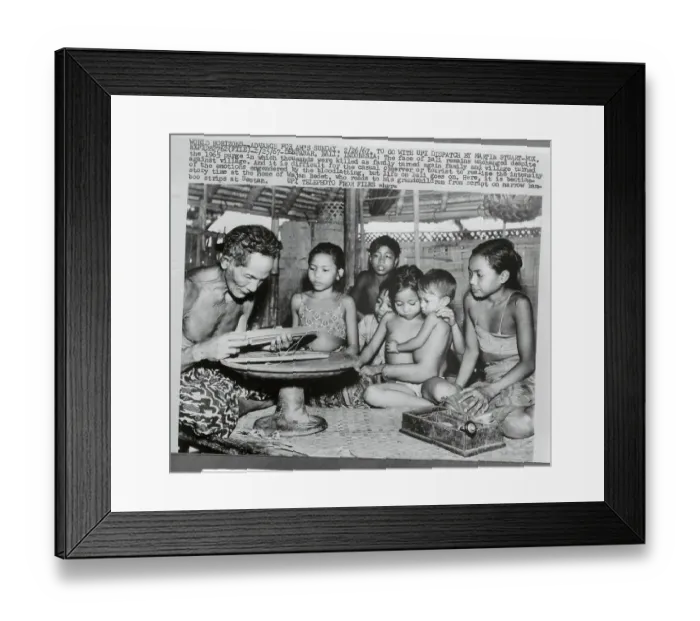 Framed Print : Wajan Bedet Reading Stories to Family Framed Print : Wajan Bedet Reading Stories to Family