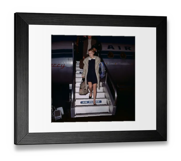 Framed Print : Mia Farrow and Laurence Harvey Leaving Airplane Framed Print : Mia Farrow and Laurence Harvey Leaving Airplane