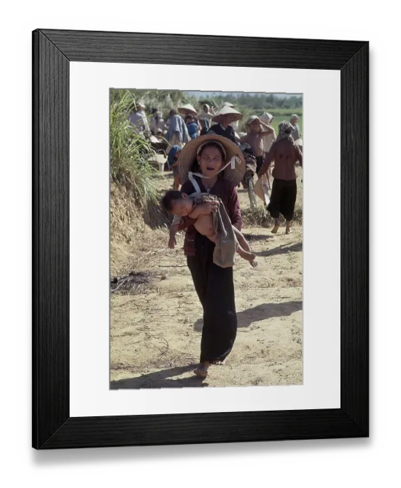Framed Print : Vietnamese Woman Holding Child Framed Print : Vietnamese Woman Holding Child