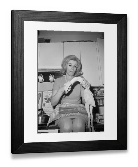 Framed Print : Joan Rivers Stuffing Banana into Chicken Framed Print : Joan Rivers Stuffing Banana into Chicken