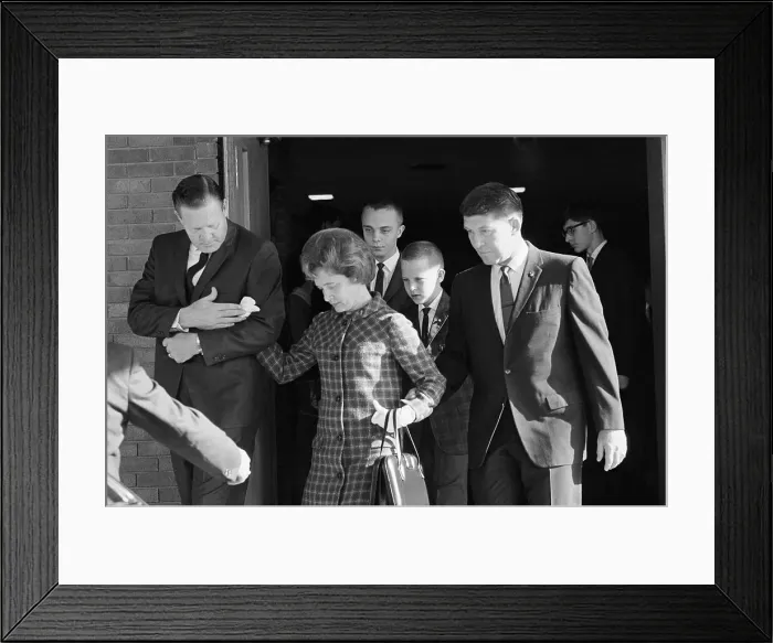 Framed Print : Mrs. Betty Grissom Being Escorted