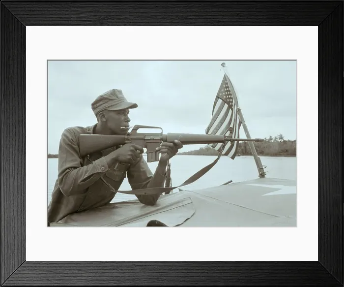 Framed Print : US Trooper on Patrol Boat Framed Print : US Trooper on Patrol Boat