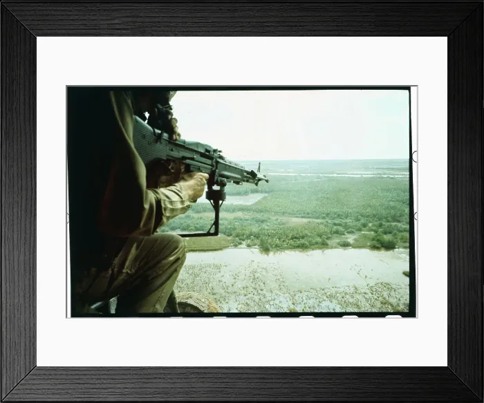 Framed Print : Soldier Aiming Machine Gun from Helicopter Framed Print : Soldier Aiming Machine Gun from Helicopter