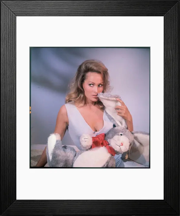 Framed Print : Ursula Andress Posing with Stuffed Rabbit Framed Print : Ursula Andress Posing with Stuffed Rabbit