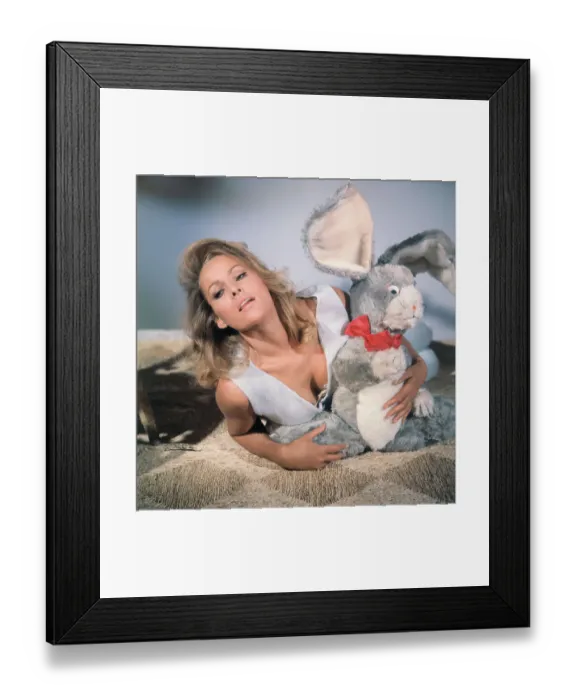 Framed Print : Ursula Andress Posing with Stuffed Rabbit Framed Print : Ursula Andress Posing with Stuffed Rabbit