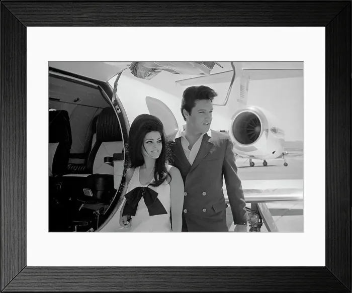 Framed Print : Elvis and Priscilla Presley Posing near Airplane Framed Print : Elvis and Priscilla Presley Posing near Airplane