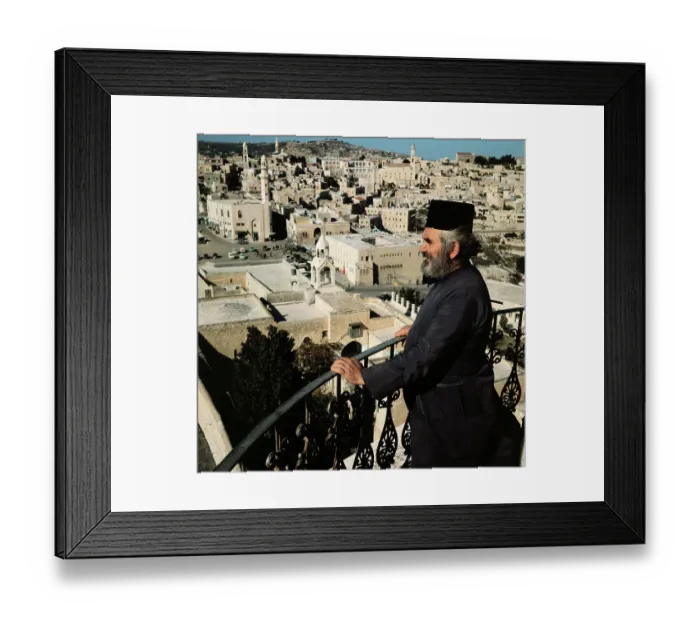 Framed Print : Man Standing on Balcony and Gazing into Bethlehem Framed Print : Man Standing on Balcony and Gazing into Bethlehem