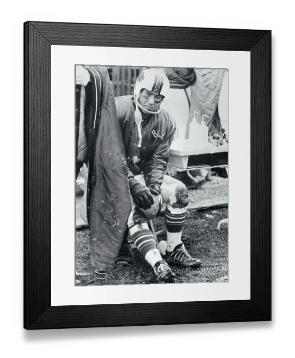 Framed Print : Jack Kemp Applying Water Bag to Knee Framed Print : Jack Kemp Applying Water Bag to Knee