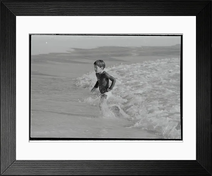 Framed Print : John F. Kennedy Jr. Playing on the Beach Framed Print : John F. Kennedy Jr. Playing on the Beach