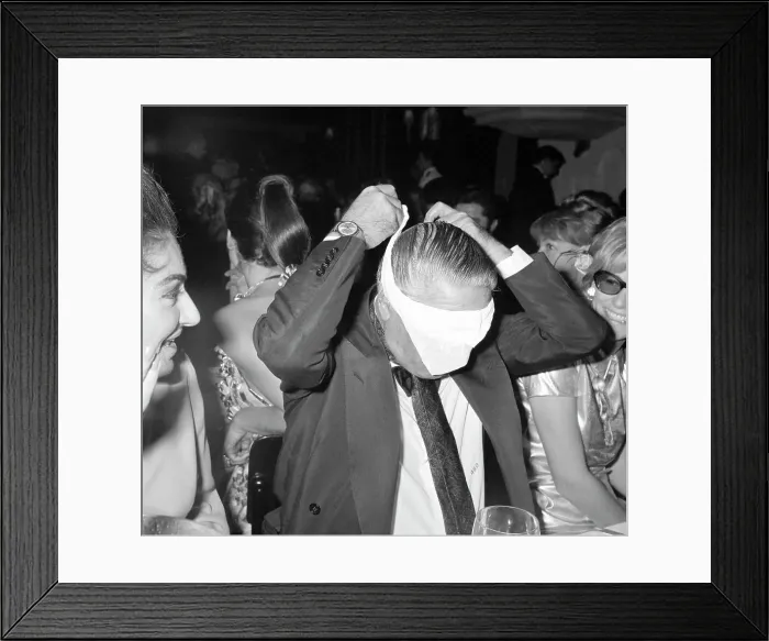 Framed Print : Aristotle Onassis Putting on Blindfold Framed Print : Aristotle Onassis Putting on Blindfold