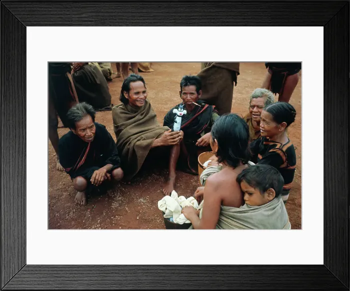 Framed Print : People Sitting on the Ground Framed Print : People Sitting on the Ground