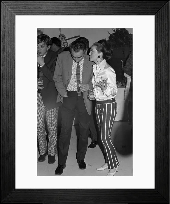 Framed Print : Michelangelo Antonioni and Natalie Wood at Party