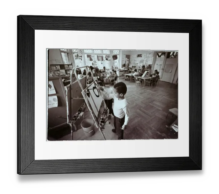 Framed Print : Boy Paints in Kindergarten Class