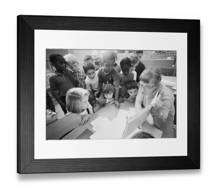 Framed Print : Teacher Reads to Students in Integrated Classroom Framed Print : Teacher Reads to Students in Integrated Classroom