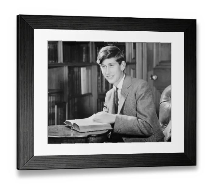 Framed Print : Prince Charles Looking Over a Book Framed Print : Prince Charles Looking Over a Book